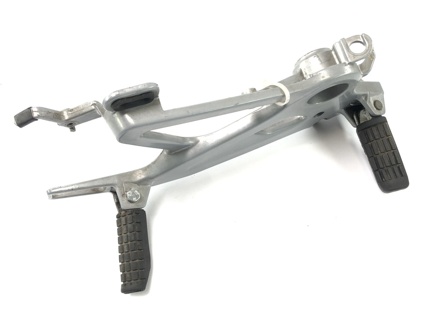 Honda SLR 650 RD09 [1997] - Fodstøttesystem på højre fodstøttebeslag