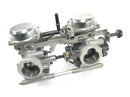 Triumph Bonneville T100 986MF [2012] - Karburator dobbelt downdraft karburator Keihin-1